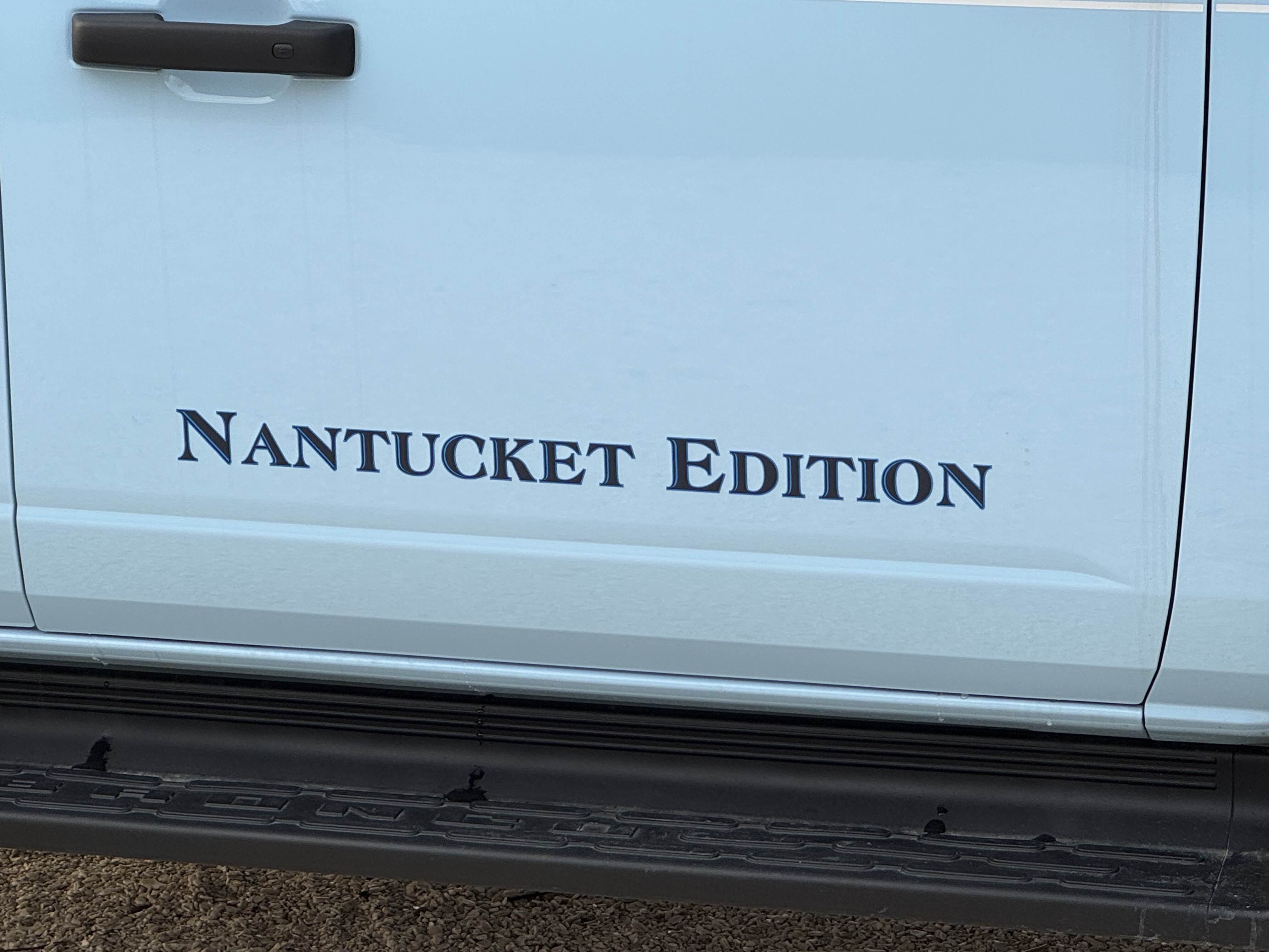 Close-up of Nantucket Edition branding on door